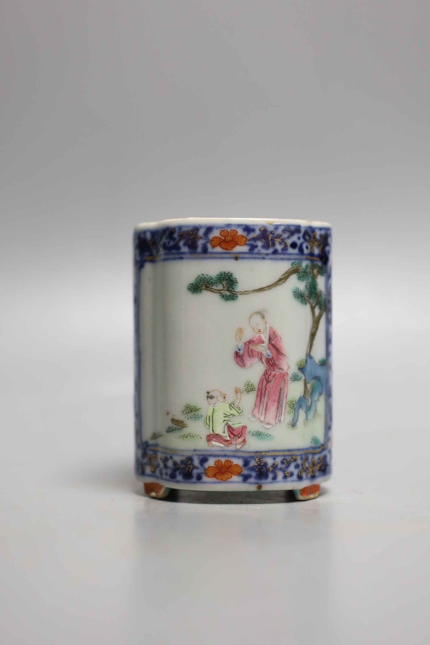 A Chinese famille rose fencai brush pot, Qianlong seal mark but 19th century, 8.1 cm high, wear to gilding